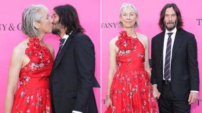 Keanu Reeves packs on PDA with girlfriend in rare red-carpet appearance together - www.foxnews.com - Britain - Los Angeles - Los Angeles