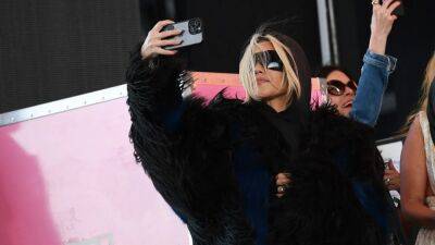Kourtney Kardashian Greets Travis Barker With Huge Hug After Attending Her 'First Blink-182' Show at Coachella - www.etonline.com - California
