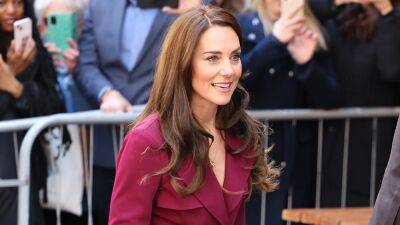 Kate Middleton Strikes Again in an Attainable Burgundy Wrap Dress - www.glamour.com - Britain - India - Birmingham