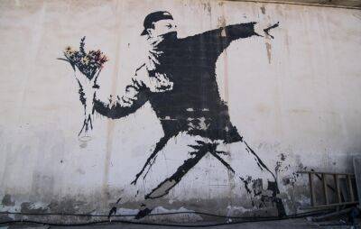 Banksy rumoured to have bought Glastonbury pub - www.nme.com