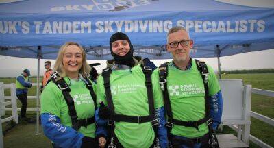 Aitch completes skydive for World Down’s Syndrome Day - www.nme.com