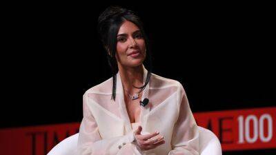 Kim Kardashian says she would ‘absolutely’ consider life ‘without the cameras’ as a full-time lawyer - www.foxnews.com