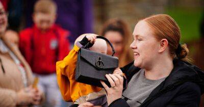 Kate Middleton's expensive designer handbag snatched by baby as mortified mum looks on - www.dailyrecord.co.uk