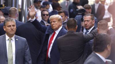 Donald Trump Arrested, Awaiting Arraignment Amid Investigation Into Stormy Daniels ‘Hush Money’ Scheme - variety.com - New York - Manhattan