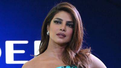 Priyanka Chopra's Turquoise Leopard Print Gown Features an Up-to-There Slit - www.glamour.com - India