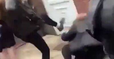 Horrific video shows schoolgirl being kicked as she cowers on floor in 'fight' - www.manchestereveningnews.co.uk - Manchester