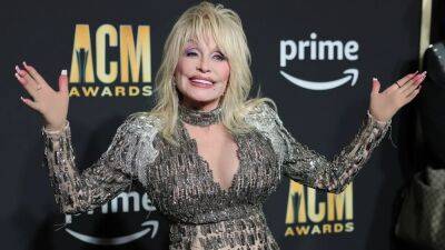 Dolly Parton Promises Fun, Wardrobe Changes and Her New 'Rockstar' Single Ahead of ACM Awards (Exclusive) - www.etonline.com