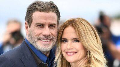 John Travolta Honors Late Wife Kelly Preston With Throwback Mother's Day Video - www.etonline.com