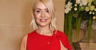Holly Willoughby brushes off Phillip Schofield 'feud' drama with glam red carpet appearance - www.ok.co.uk - Britain