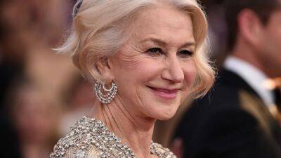 Helen Mirren Debuted Bright Blue Hair in a Double-Bun Updo at Cannes - www.glamour.com - France - Poland