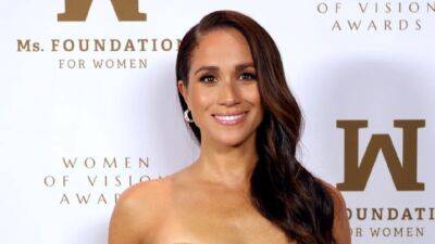 Meghan Markle Shines in Strapless Gold Gown With Prince Harry and Her Mom -- See the Pics! - www.etonline.com - New York