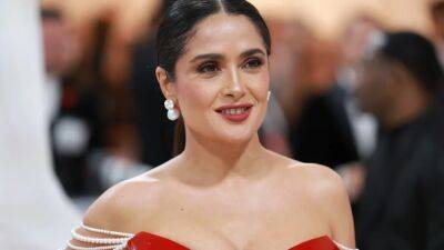 Salma Hayek Pinault Put a Chanel-Inspired Spin on a Patent Red Corset at the Met Gala - www.glamour.com - New York