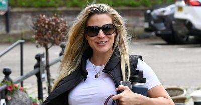 Pregnant Gemma Atkinson flashes blossoming baby bump as she arrives for work - www.ok.co.uk - Manchester