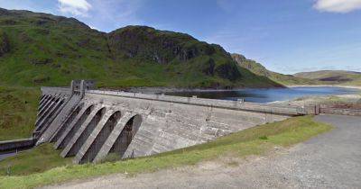 Body pulled from water at Scots beauty spot after two men get into difficulty - www.dailyrecord.co.uk - Scotland - Beyond