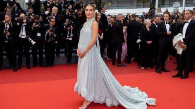 Claire Holt Reveals She's Pregnant With Baby No. 3 on Cannes Film Festival Red Carpet - www.etonline.com - Australia - France - county Holt