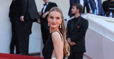 Rosie Huntington-Whiteley Nearly Avoids Wardrobe Malfunction in Sultry High-Slit Dress at Cannes - www.usmagazine.com - Italy