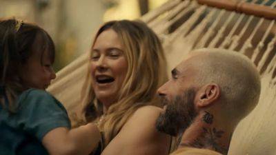 Adam Levine's Wife Behati Prinsloo and Their Daughters Steal the Spotlight in Maroon 5's 'Middle Ground' Video - www.etonline.com - Las Vegas