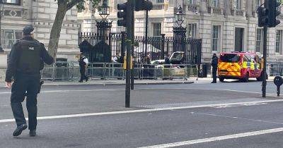 BREAKING: Man arrested and roads taped off as car crashes into Downing Street gates - www.manchestereveningnews.co.uk - Manchester - city Chinatown