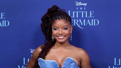 Halle Bailey Made Ariel's Iconic Red Hair Her Own With Copper Locs for 'The Little Mermaid'—Here's How She Got the Look - www.glamour.com