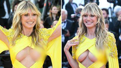 Heidi Klum suffers wardrobe malfunction at Cannes Film Festival in sexy yellow gown - www.foxnews.com - USA - Germany