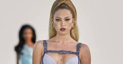 Lila Moss stuns in lilac mini dress as she walks the runway for Versace in Cannes - www.ok.co.uk - Britain
