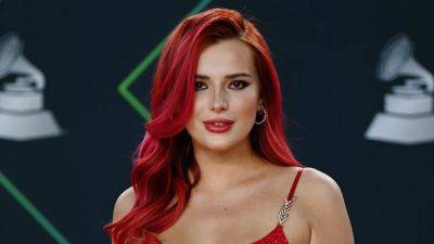 Bella Thorne Is Engaged to Mark Emms -- See Her Massive Ring - www.etonline.com - Britain