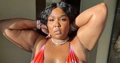 Lizzo Is Ready for Bikini Season, Poses in Pink Swimsuit Over Memorial Day Weekend: Photo - www.usmagazine.com