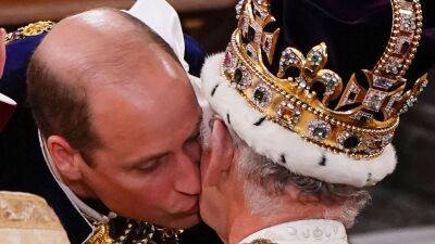 Prince William Kisses King Charles III on Cheek as He Swears Loyalty to Dad at Coronation - www.etonline.com - Ukraine