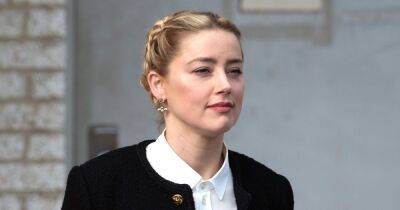 Amber Heard cuddles daughter Oonagh as pair settle into Madrid life after 'quitting PA' - www.ok.co.uk - Spain - USA - California - county Valley - Washington - city Madrid, Spain - county Fairfax