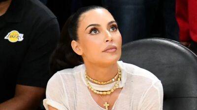 Kim Kardashian Declares 'I Love Nerds' With Fashion Statement at Lakers Game - www.etonline.com - Los Angeles - city Memphis