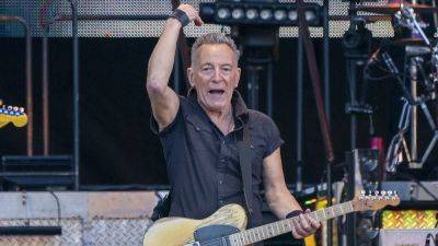 Bruce Springsteen Takes a Hard Fall Onstage During Performance - www.etonline.com - city Amsterdam