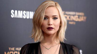 The Hunger Games Star Jennifer Lawrence Is ‘100 Percent’ Down to Play Katniss Everdeen Again - www.glamour.com
