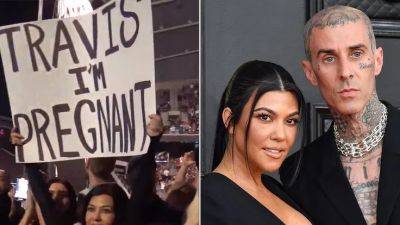 Kourtney Kardashian Announces Pregnancy at Husband Travis Barker's Concert - www.glamour.com