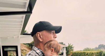 Bruce Willis cradles his baby granddaughter in rare snap amid dementia battle - www.msn.com