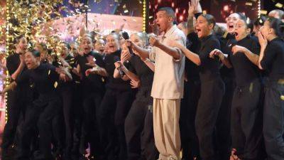 'America's Got Talent': 'Mesmerized' Howie Mandel Slams Golden Buzzer for Hypnotic Dance Crew -- Watch! - www.etonline.com - county Early