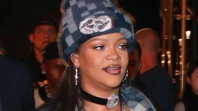 Rihanna's Denim Jumpsuit Gave Her Baby Bump a Front Row Seat at Louis Vuitton - www.glamour.com - Paris