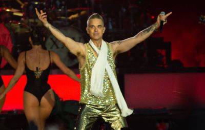 Robbie Williams on the two things that “saved” him from addiction and depression - www.nme.com - county Isle Of Wight