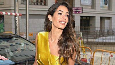 Amal Clooney Trades in a Disco Ball Dress and Curls for a Golden Summer Jumpsuit in Europe - www.glamour.com - London - Madrid - city Vienna