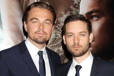 Leonardo DiCaprio & Tobey Maguire Prove Their BFF Bona Fides With Matching Necklaces On Paris Outing - etcanada.com - Paris - Italy