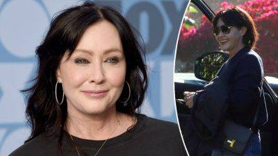 Shannen Doherty, 'Charmed' actress, all smiles as she steps out after revealing cancer spread to her brain - www.foxnews.com - California - county Parker
