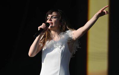 Chvrches pay tribute to “world’s greatest goth” Robert Smith - www.nme.com
