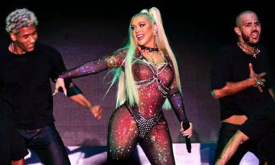 Christina Aguilera celebrates Pride in sheer jumpsuit and chain harness: See her looks - us.hola.com - New York