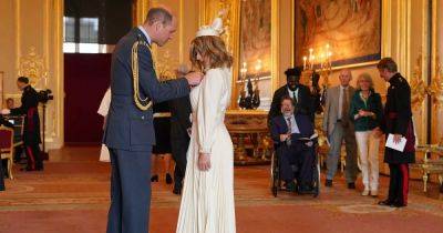 Kate Garraway's husband Derek looks so proud as she's awarded MBE by Prince William - www.ok.co.uk - Britain