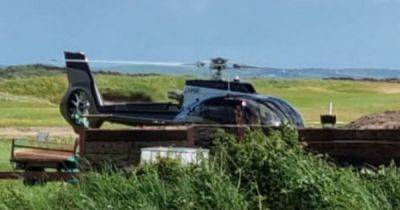 'UK’s richest gypsy' lands at seaside golf course in signature £4m ‘G-YPSE’ helicopter - www.dailyrecord.co.uk - Britain - Beyond