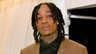 Wiz Khalifa Is Recovering From a Pelvis Injury, Shares Video of Him Using Crutches - www.etonline.com