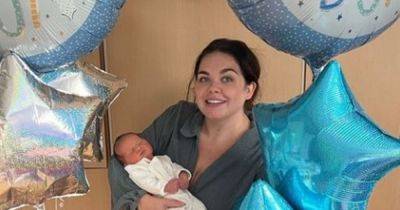 Scarlett Moffatt cradles newborn son amongst balloons in hospital in sweet new pic - www.ok.co.uk