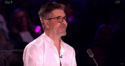 Britain's Got Talent's Simon Cowell apologises as he 'gives away' act's magic trick - www.ok.co.uk - Britain