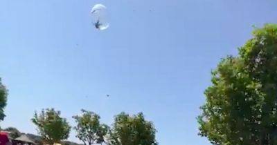 Child filmed falling 20ft from sky in inflatable 'zorb' ball horror - www.dailyrecord.co.uk