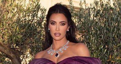 Kim Kardashian Looks Like Royalty in Billowing Purple Gown at Dolce and Gabbana Alta Moda Show - www.usmagazine.com - Italy - Washington