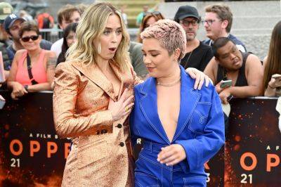 Florence Pugh Saves Emily Blunt From A Wardrobe Malfunction As Her Blazer Nearly Pops Open At ‘Oppenheimer’ Premiere - etcanada.com